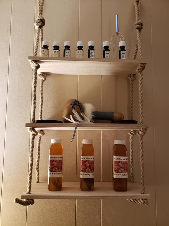 Shelves of essential oils, a rattle and Florida water